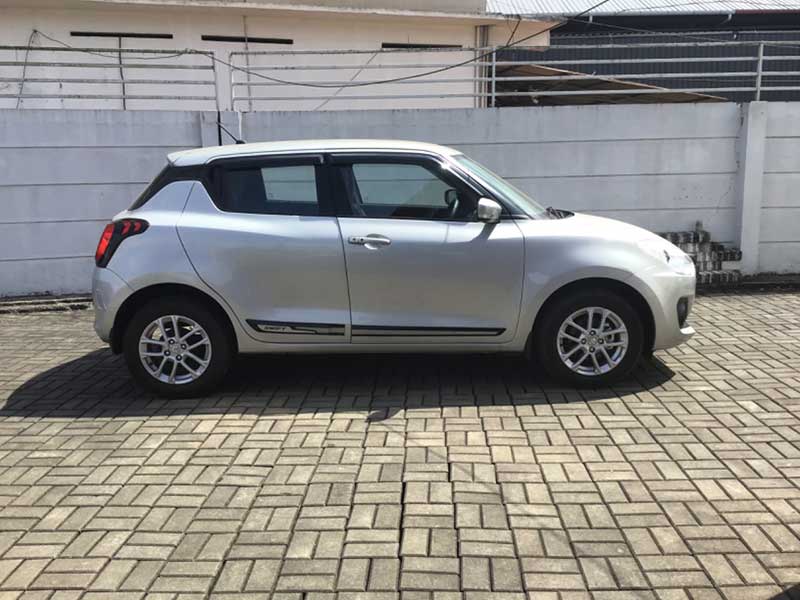 2021-swift-Zxi-used-car-side-view