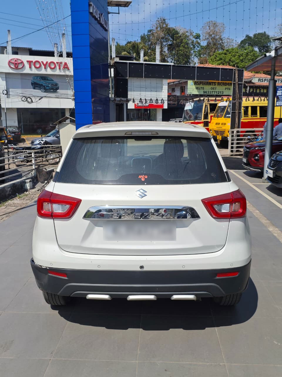 Maruti Suzuki Brezza LXI 2021 back view available at AVG Motors Kerala